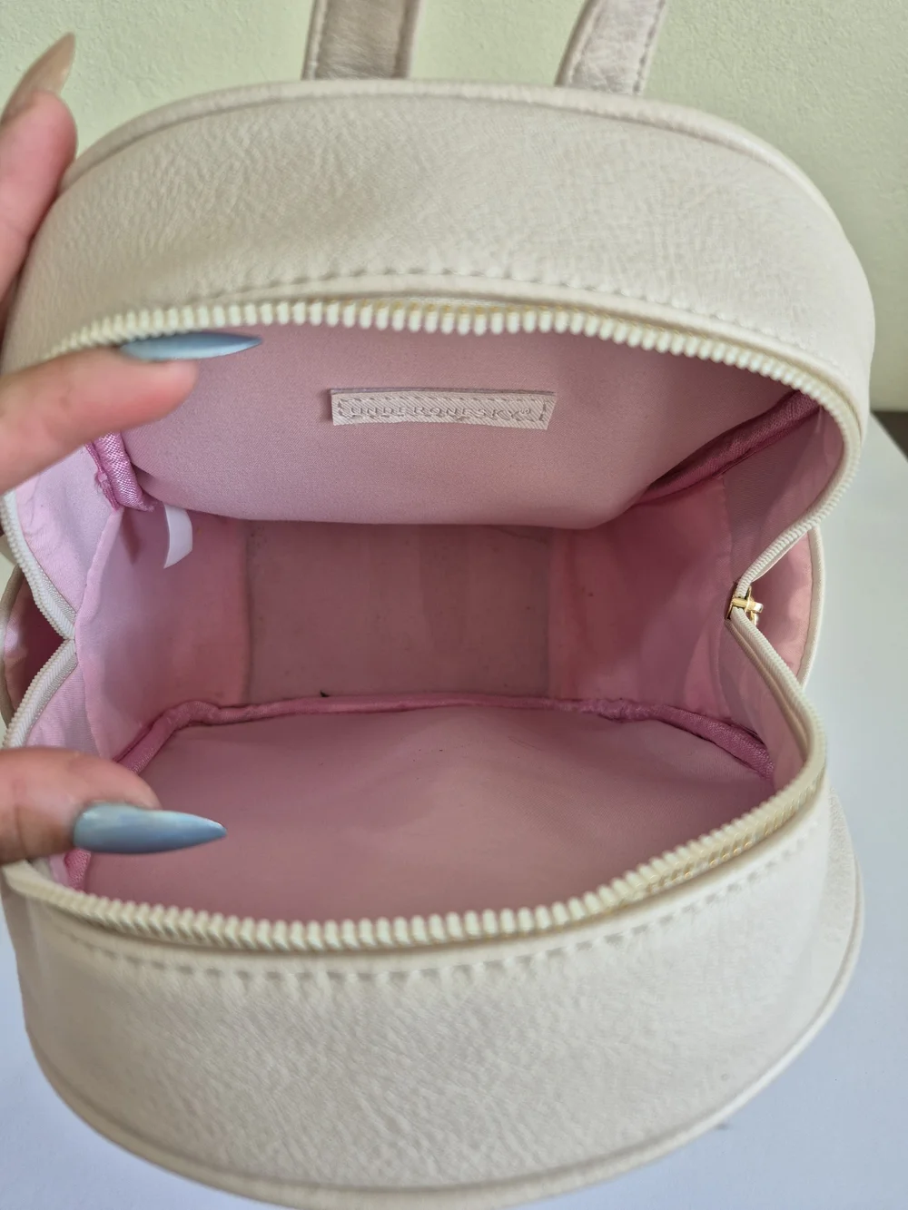 Under One Sky Cream Quilted Backpack with Gold Heart Lock